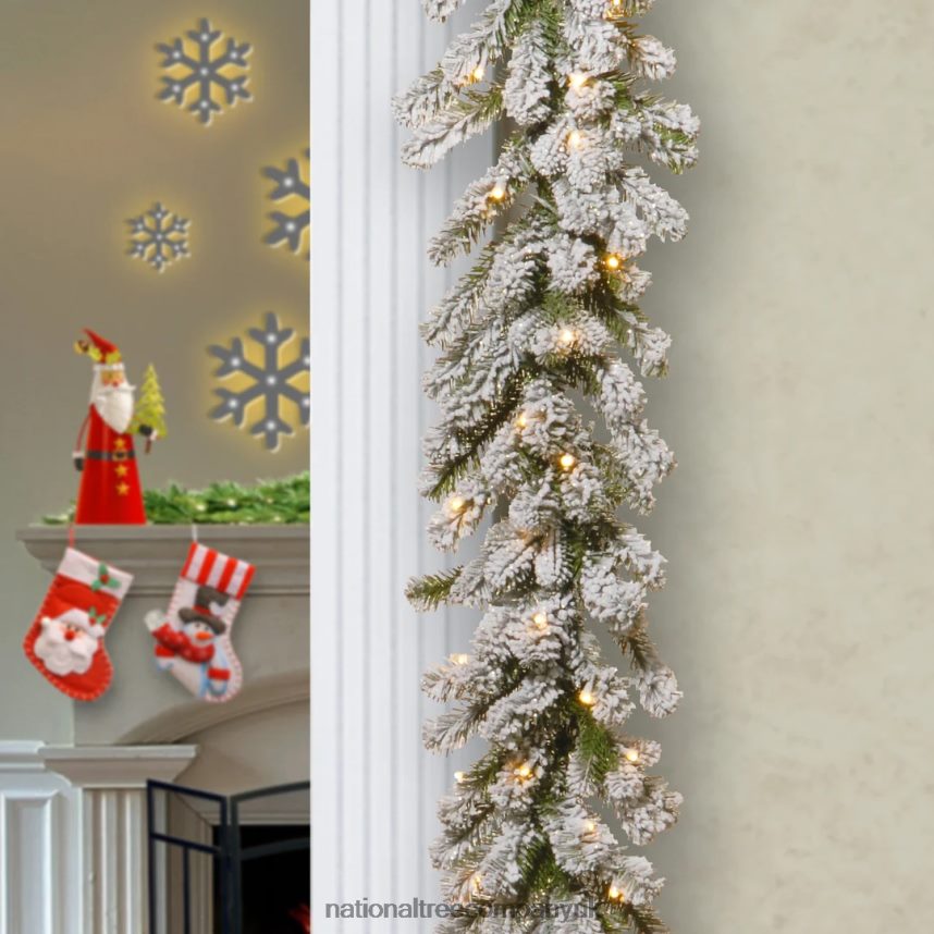 Greenery | National Tree Company Pre Lit Artificial Garland Snowy Sheffield Green Frosted Decorated with Multifunctional Twinkling LED Lights Plug In Christmas Collection 9 Feet F2L4F385